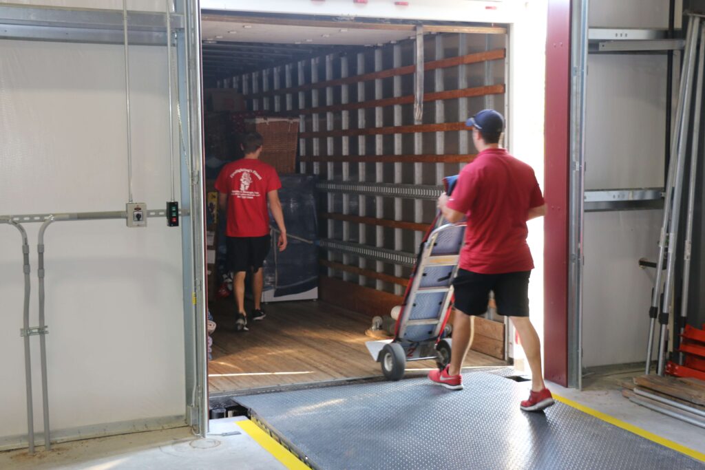 Two Workers Performing Residential Moving Service in Austin, TX