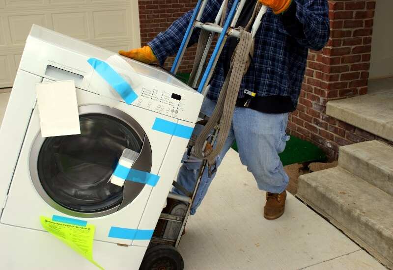 A professional packed a washing machine for a residential move in Fort Worth, TX
